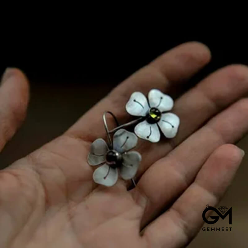 Silver Colored Petals Set with Green Zircon Earrings