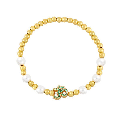 Brass Pearl Beaded Om Symbol Bracelet