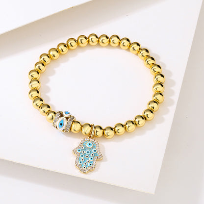 Halo Hamsa Pendant Golden Bead Bracelet