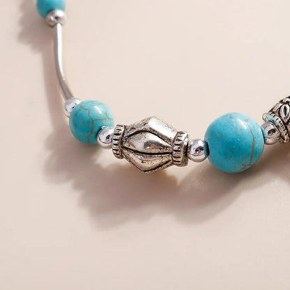 Turquoise Beaded Silver Cross Pendant Bracelet