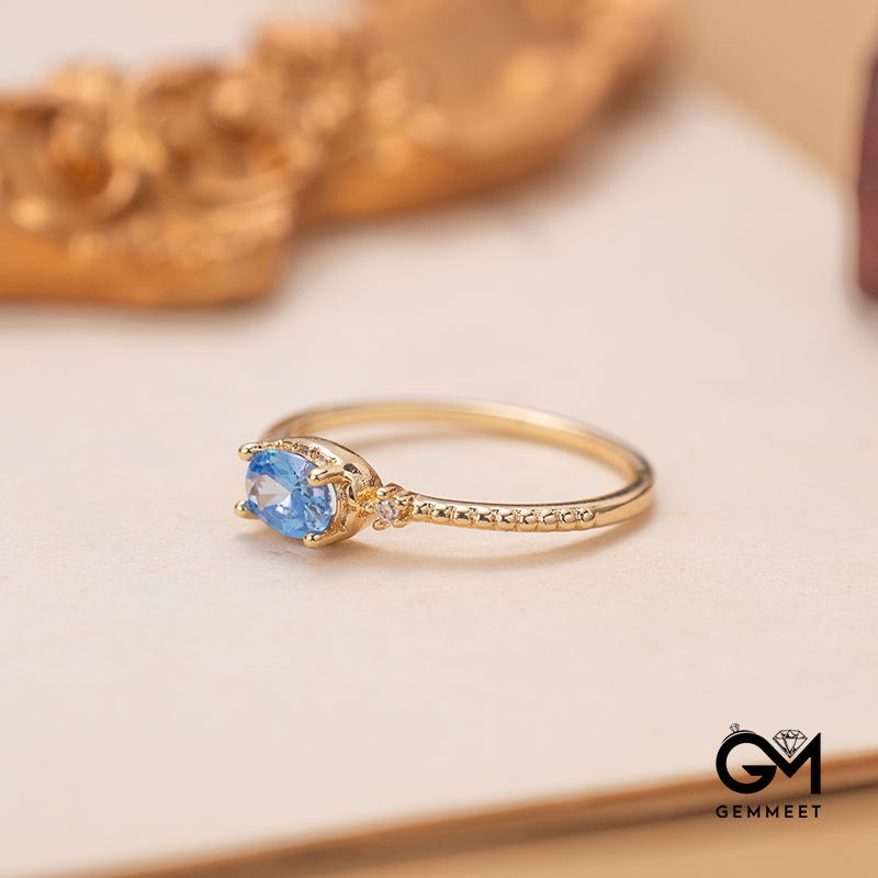 Light Luxury Gold Plated Oval Blue Zircon Ring