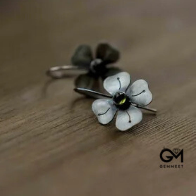 Silver Colored Petals Set with Green Zircon Earrings