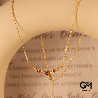 "Symbol of Independence" Garnet Diamond Necklace