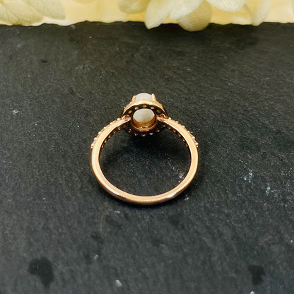 Oval Cut Rose Golden Moonstone Halo Ring