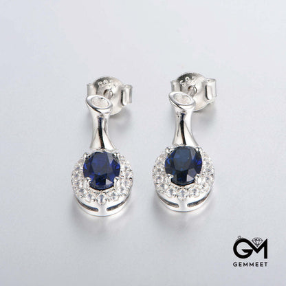 White Gold Full Stones Drop Earrings with Oval Brilliant Cut Sapphire