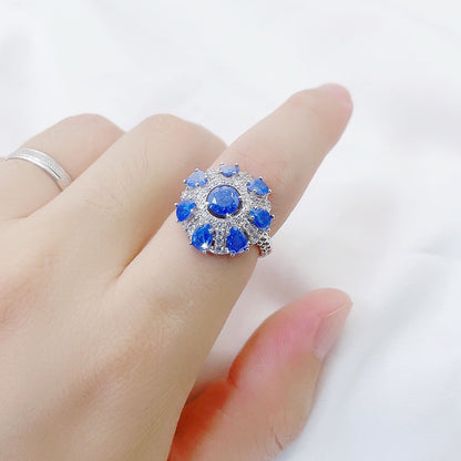 Round Seven Flowers Blue Zircon Ring