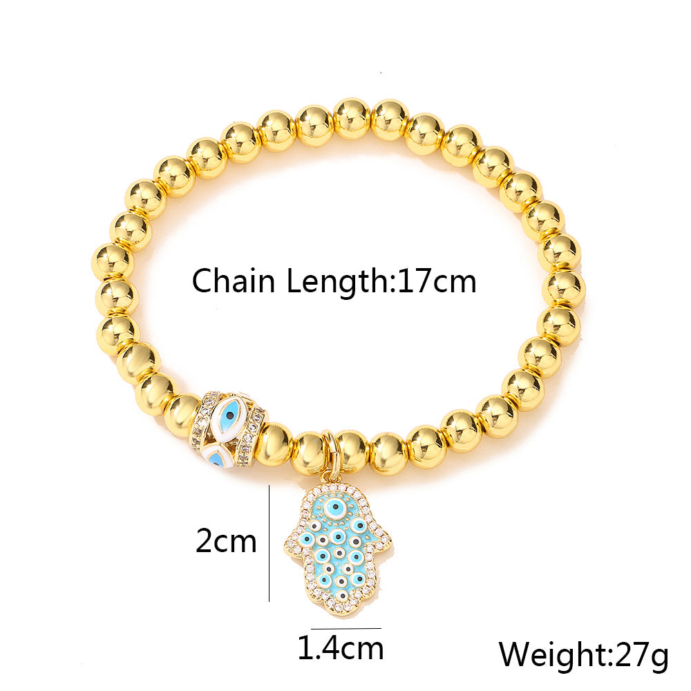 Halo Hamsa Pendant Golden Bead Bracelet