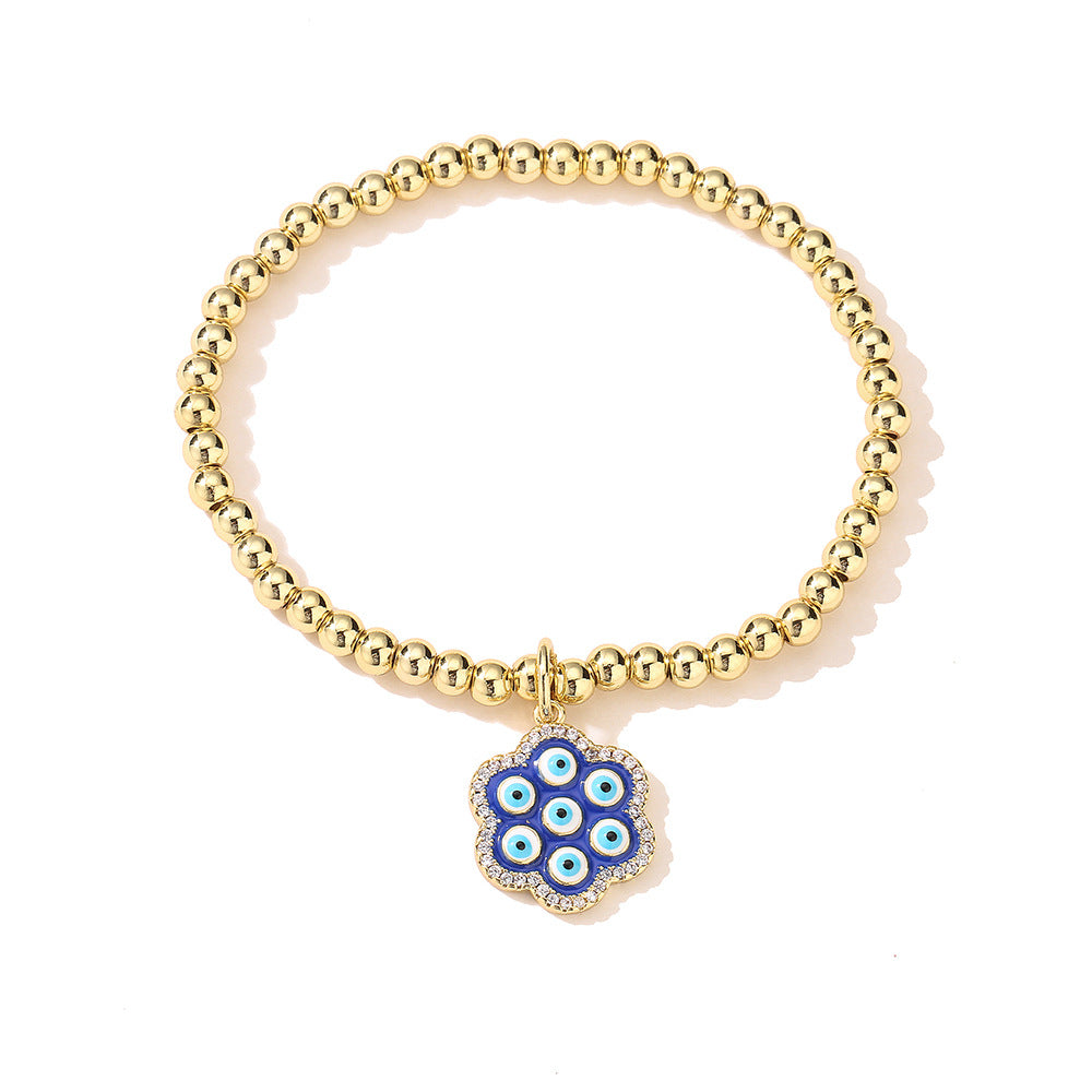 Halo Flower Pendant Golden Bead Bracelet