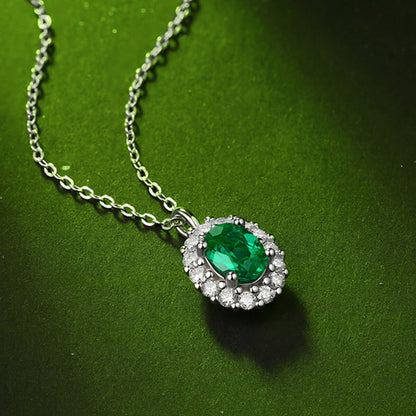 White Gold Oval Cut Emerald Halo Pendant Chain