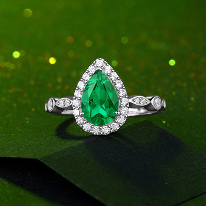 White Gold Drip Shape Emerald Halo Ring