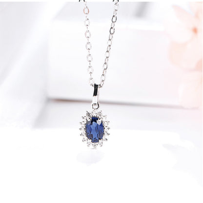 Sun Flower Shape Pendant with Oval Brilliant Cut Blue Sapphire