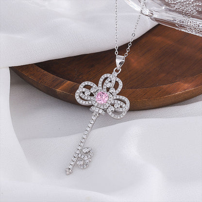 White Gold Classic Iris Key Shape Pink Sapphire Pendant