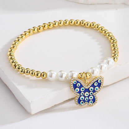 Halo Butterfly Pendant Golden Bead Bracelet