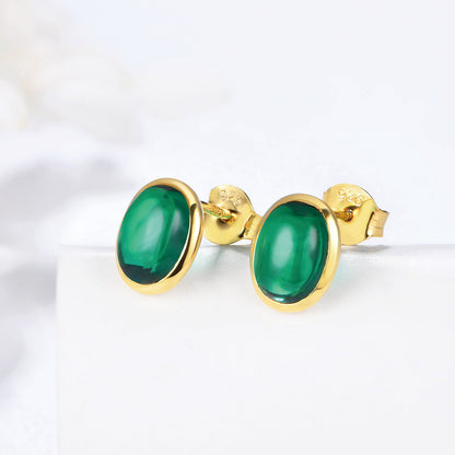 Golden Stud Earrings With Oval Emerald Gem