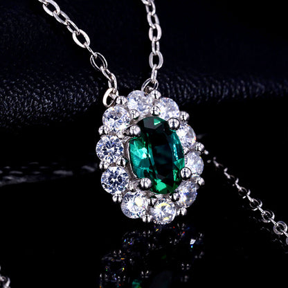 Oval Cut Emerald Halo Pendant Chain