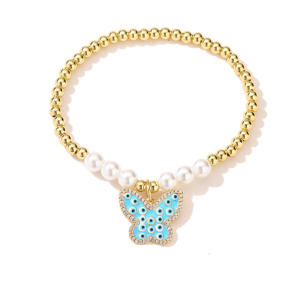 Halo Butterfly Pendant Golden Bead Bracelet