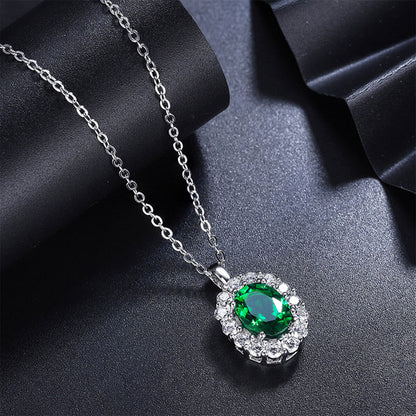 White Gold Oval Cut Emerald Halo Pendant Chain